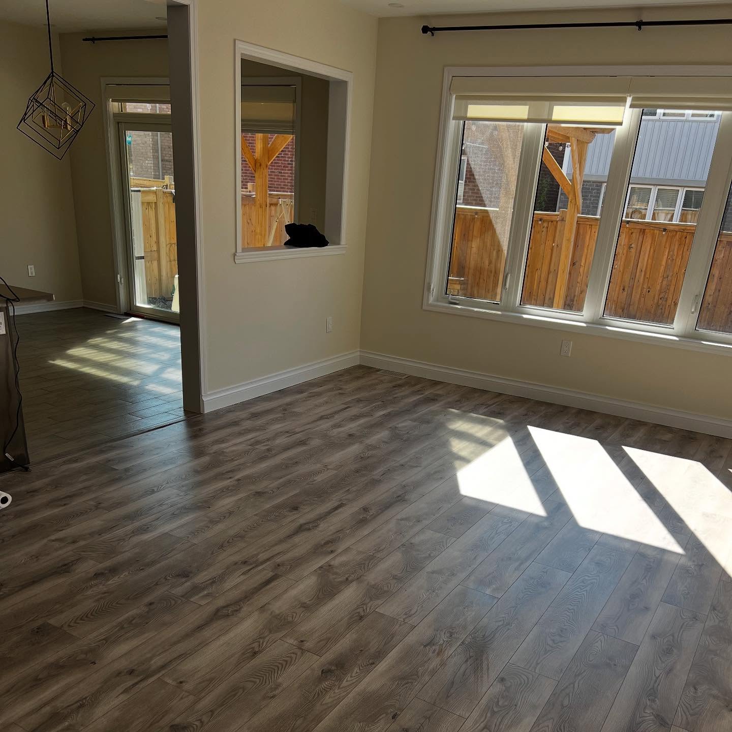 Living room with hardwood floors - freshly painted