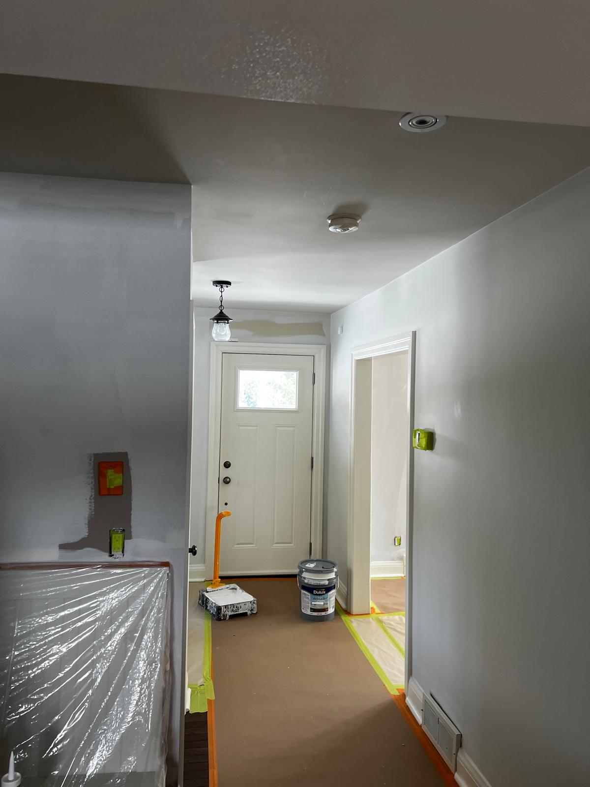 Hallway preparation with floor protection and primer application